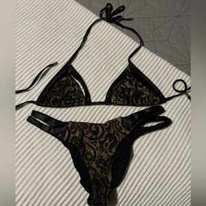 Beach Bunny bathing suit. Size medium for top and bottom. So cute!